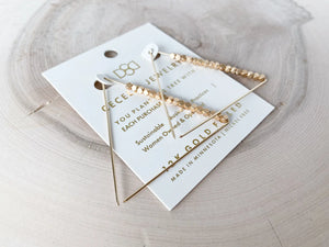 Geometric Large Triangle Hoops
